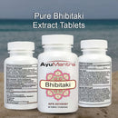 Three white bottles of AyuMantra Bibhitaki Extract Tablets are shown against a blurred beach background, with the center bottle facing forward and the side bottles showing the back labels. Large text at the top reads 'Pure Bhitaki Extract Tablets'.