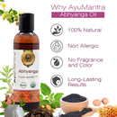 AyuMantra Abhyanga Oil bottle with natural ingredients and benefits on a white background