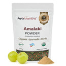 AyuMantra Amalaki Powder packaging with green fruits and powder on a white background