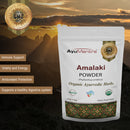 AyuMantra Amalaki Powder benefits package with a sunset background