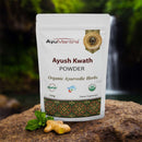 Ayush Kwath Powder packaging with AyuMantra branding on a natural background