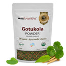 AyuMantra Gotukola Powder packaging withGotukola leaves on a white background
