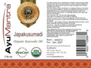 Label of AyuMantra Japakusumadi Organic Ayurvedic Oil with certification logos and product details.