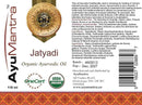 Label of AyuMantra Jatyadi Organic Ayurvedic Oil with branding and certification logos.