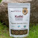 AyuMantra Kutki Powder packaging on a grassy background