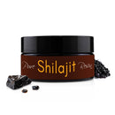 Jar of Pure Shilajit Resin with shilajit pieces on a white background