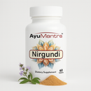 AyuMantra Nirgundi dietary supplement bottle with floral design on a white background