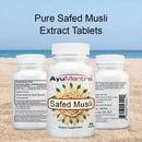 AyuMantra Safed Musli dietary supplement bottles on a sandy background with text 'Pure Safed Musli Extract Tablets'.