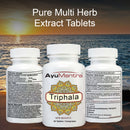 Three white supplement bottles labeled AyuMantra Triphala are shown against an ocean sunset background, with large text reading 'Pure Multi Herb Extract Tablets' above them.