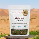 AyuMantra Vidanga Powder packaging with desert background