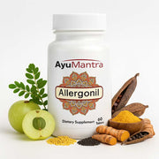 AyuMantra Allergonil tablets bottle with amla, turmeric, and other herbal ingredients on a white background.