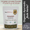 Amalaki powder package with AyuMantra branding on a light background