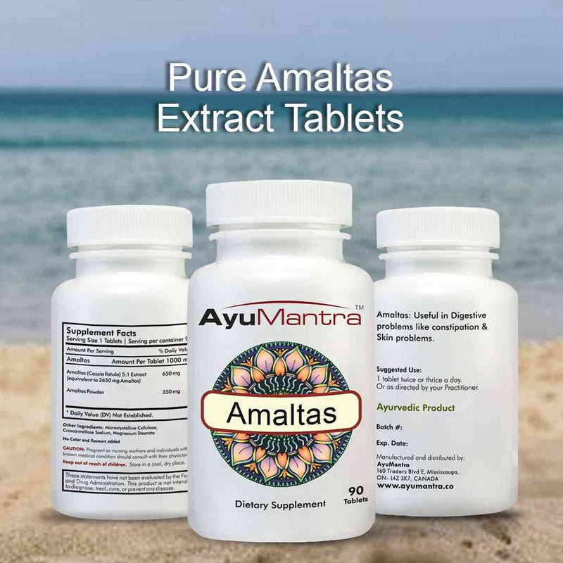 Amaltas tablets in front and back bottles with supplement facts text set against a beach background.