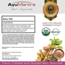 AyuMantra Anu Oil packaging with ingredients list, USDA Organic certification, and Ayurvedic symbols.