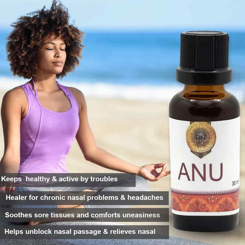 Woman meditating on a beach with a bottle of ANU product in the foreground