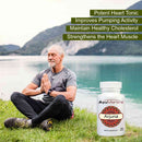 Man meditating by a lake with an AyulMantra Arjuna supplement bottle in the foreground.