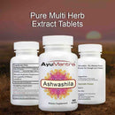 AyuMantra Ashwashila dietary supplement bottles with a blurred natural background.