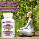 AyuMantra Ayufem supplement bottle with a woman sitting outdoors.