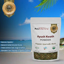 Ayush Kwath Powder package with a beach background