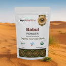 AyuMantra Babul Powder package on a desert background