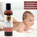 Baby massage oil bottle with baby and text benefits on a white background