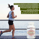 Women running with AyuMantra Bhibitaki supplement bottle on a scenic background.
