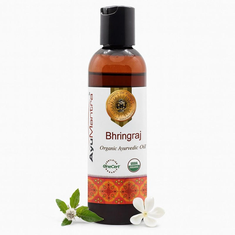 Bhringraj organic ayurvedic oil bottle with a white background
