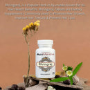AyuMantra Bhringraj dietary supplement bottle with natural elements on a brown background.