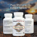 Three bottles of AyuMantra Bhringraj Extract Tablets with a scenic background.