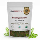 AyuMantra Bhumyamalaki Powder packaging with green leaves on a white background