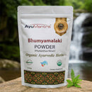 AyuMantra Bhumyamalaki Powder packaging with a natural background