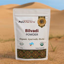 AyuMantra Bilvadi Powder packaging with desert background