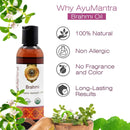 AyuMantra Brahmi oil bottle with product features on a white background