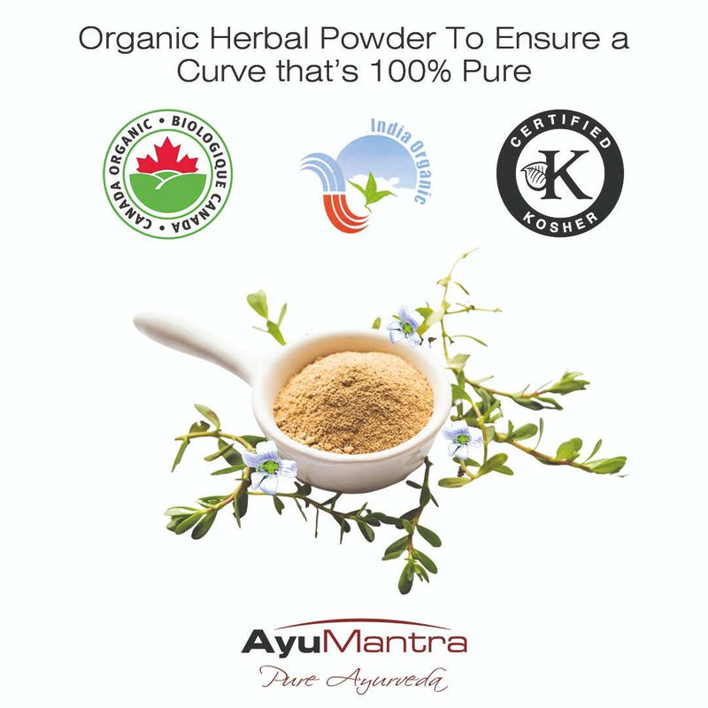 Organic herbal powder in a white scoop with certification logos and AyuMantra branding on a white background.