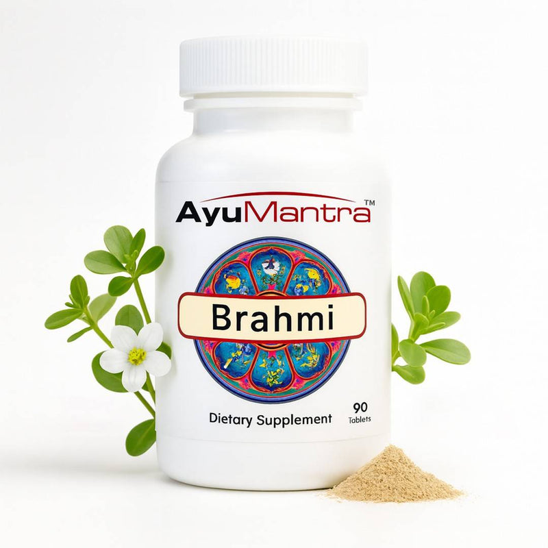 Ayumantra Brahmi tablets bottle with fresh brahmi herb and powder on white background.