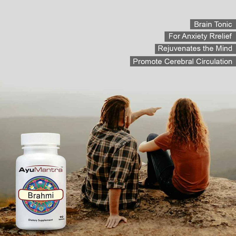 Ayurvedic supplement bottle labeled 'Brahmi' with two people sitting on a rock by a lake.