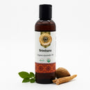 Bottle of Brimhana Organic Ayurvedic Oil with a white background