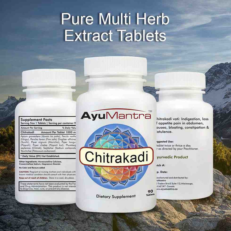 AyuMantra Chitrakadi dietary supplement bottles with mountain background.