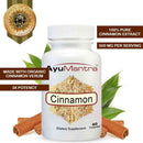 AyuMantra cinnamon capsules bottle with potency, organic cinnamon extract badges and leaves.