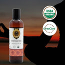 Bottle of Dashmool Bala organic ayurvedic oil with USDA Organic and OneCert logos on a blurred background.