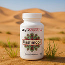 AyuMantra Dashmool dietary supplement bottle in a desert setting.