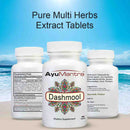 AyuMantra Dashmool dietary supplement bottles with a beach background.