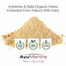 Pile of organic powder with AyuMantra branding and certification logos on a white background