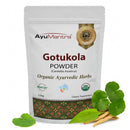 AyuMantra Gotukola Powder packaging withGotukola leaves on a white background
