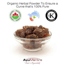 Glass bowl of organic herbal powder with certification logos on a white background