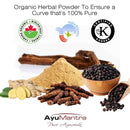 Organic herbal powder with various herbs and certification logos on a white background, featuring AyuMantra brand.