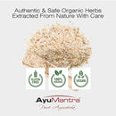 Herbal product with AyuMantra branding and certification logos on a white background