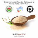 Organic herbal powder in a wooden scoop with certification logos and AyuMantra branding on a white background.