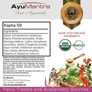 AyuMantra Kapha Oil label with ingredients list, organic certification logos, and product imagery.