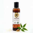 Bottle of Karpuradi Organic Ayurvedic Oil with a cannabis leaf on a white background